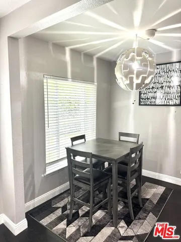 a kitchen with a stove a sink and a refrigerator