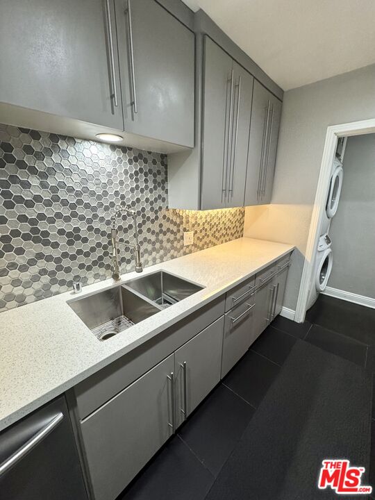 50 Elm Avenue, Unit 5 Long Beach, CA 90802 - Photo 40 of 44 a kitchen with a sink and cabinets