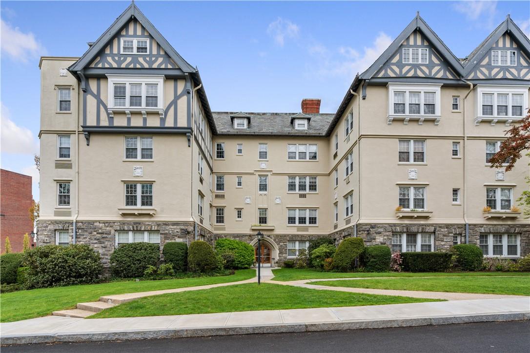 1 Westbourne, Unit 2B Bronxville, NY 10708 - Photo 1 of 1 a front view of a residential apartment building with a yard
