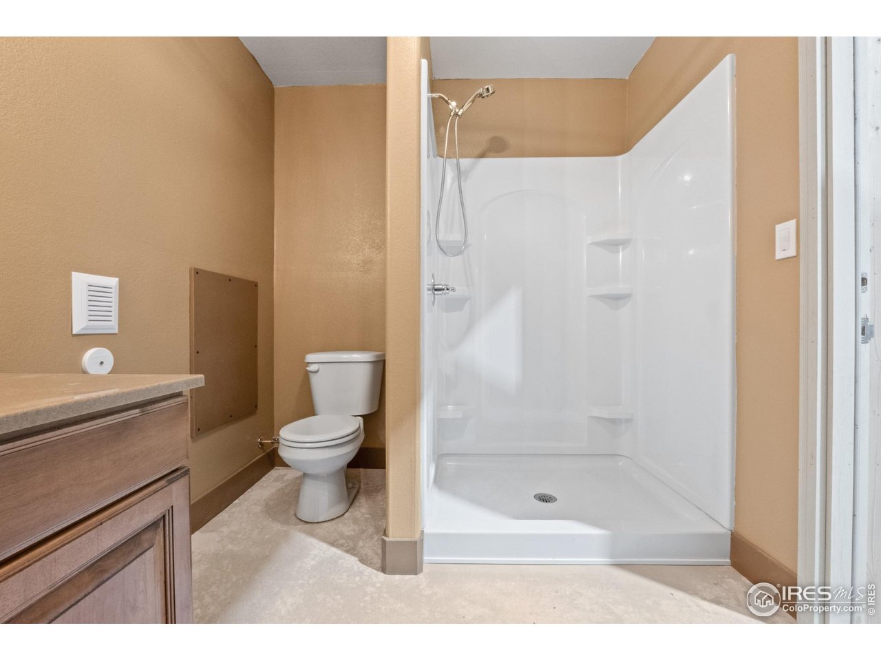 7908 P 3 Road Wiggins, CO 80654 - Photo 40 of 40 Convenient bathroom in the shop with modern fixtures and private utility access.