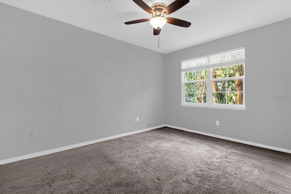 3250 Corona Village Way, Unit 102 Orlando, FL 32835 - Photo 15 of 33 an empty room with a window