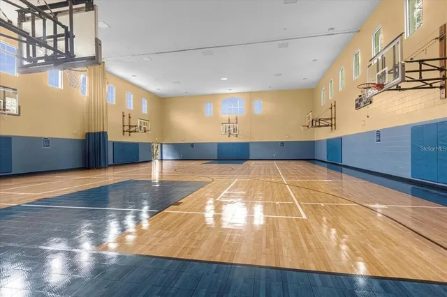 a view of a hall with wooden floor