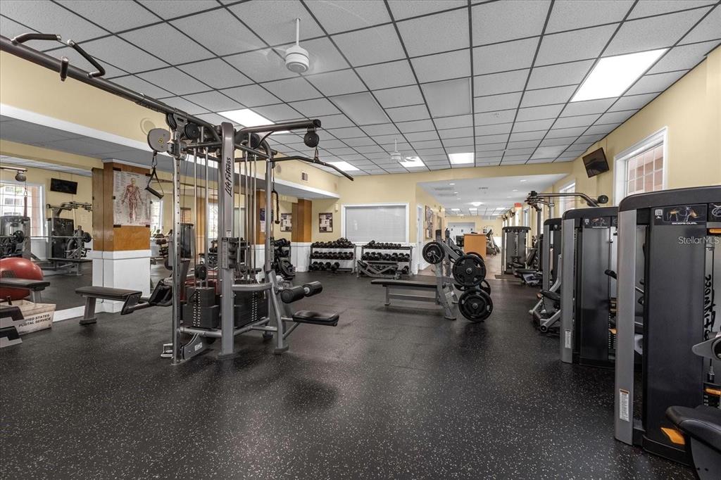 3250 Corona Village Way, Unit 102 Orlando, FL 32835 - Photo 29 of 33 a view of a room with gym equipment