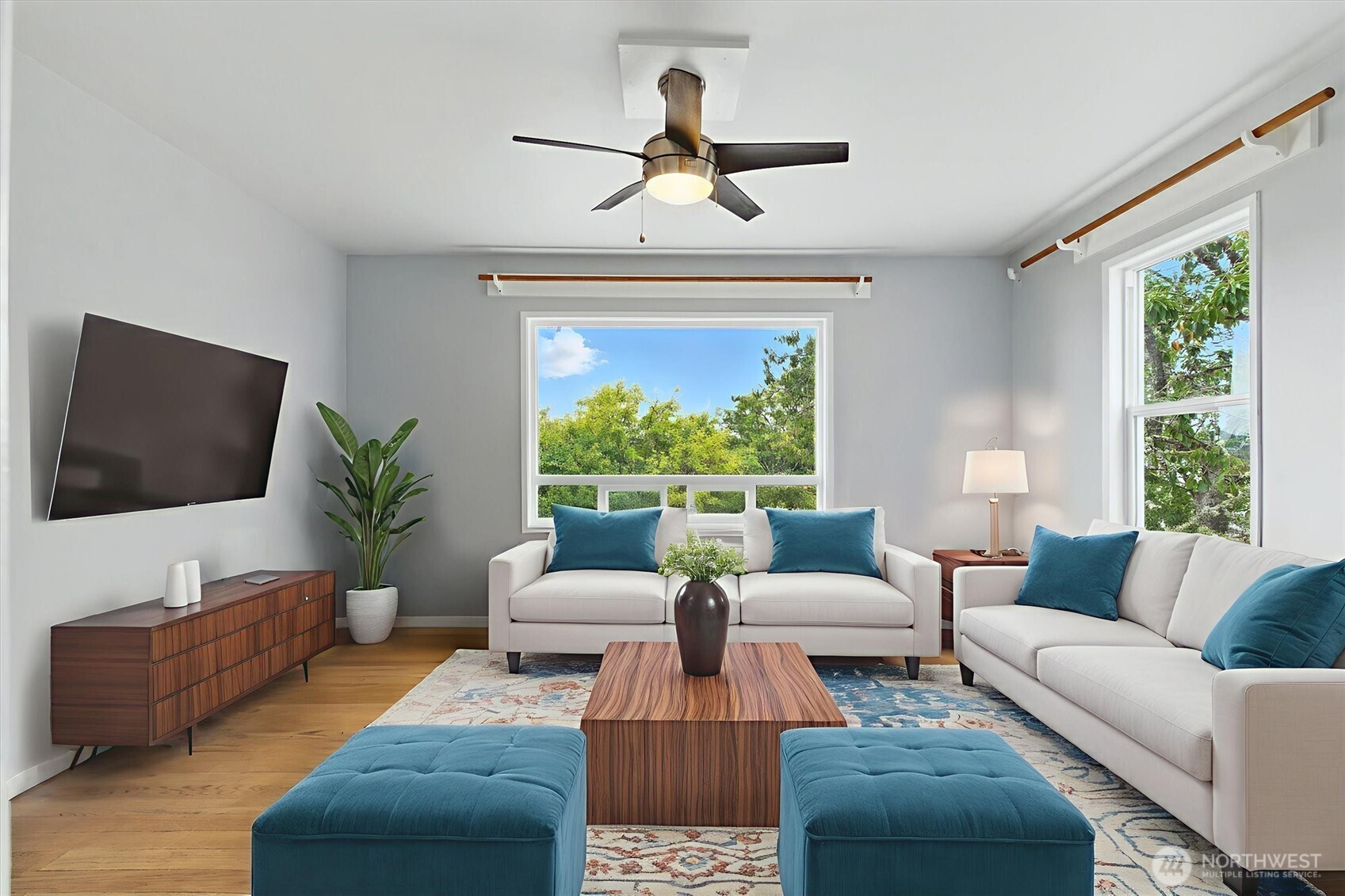 2510 Stephenson Avenue Bremerton, WA 98310 - Photo 13 of 40 a living room with furniture flat screen tv and a large window