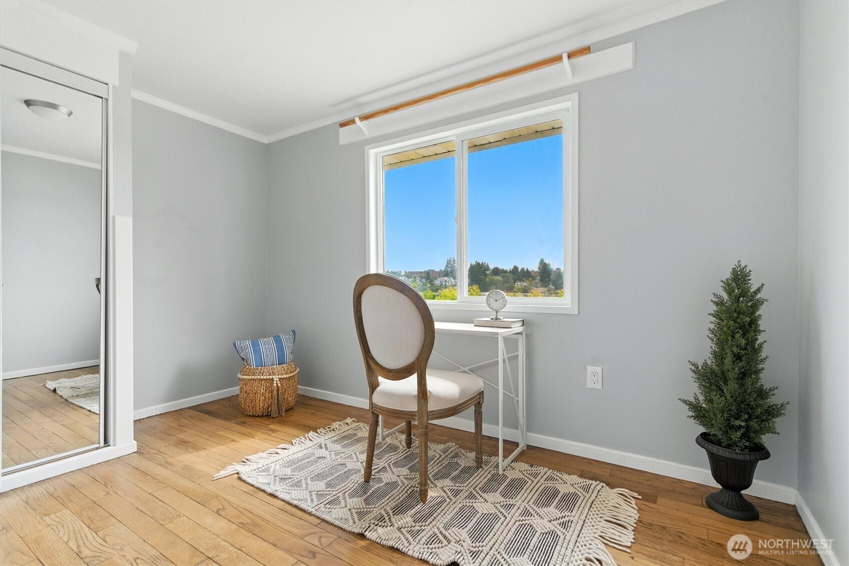2510 Stephenson Avenue Bremerton, WA 98310 - Photo 30 of 40 a view of a workspace room with wooden floor and chair