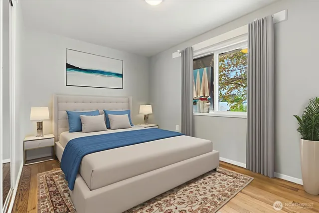 a front view of a house with garden and chairs