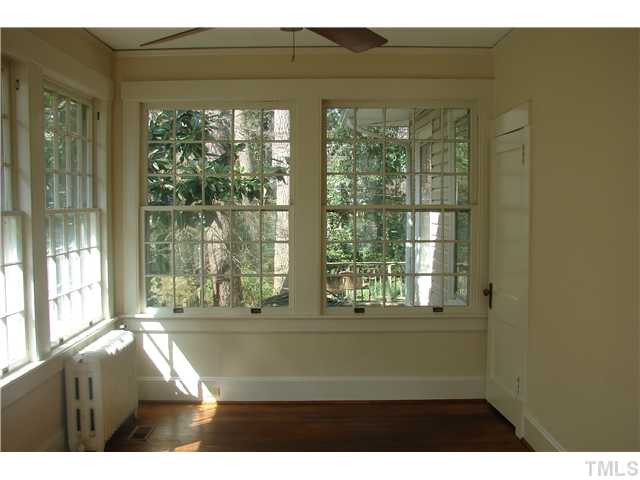 303 Hillcrest Road Raleigh, NC 27605 - Photo 3 of 21 a living room with a large window