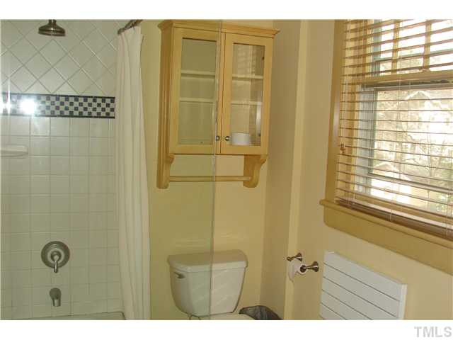 303 Hillcrest Road Raleigh, NC 27605 - Photo 6 of 21 a bathroom with a shower