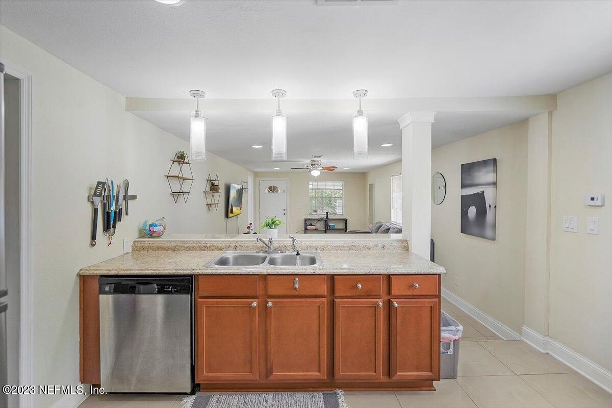 197 Lynn Street St. Augustine, FL 32084 - Photo 11 of 24 a bathroom with a sink double vanity and a mirror