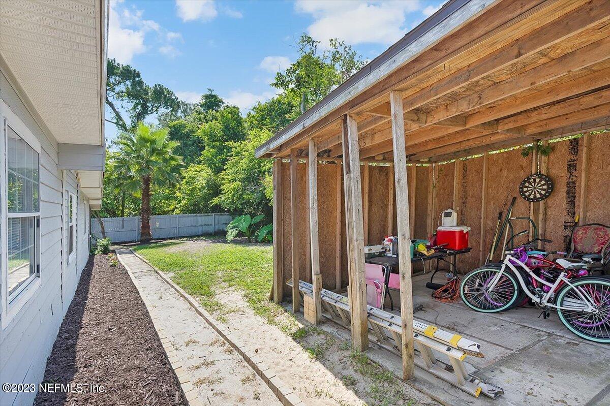 197 Lynn Street St. Augustine, FL 32084 - Photo 21 of 24 a view of a storage room with furniture