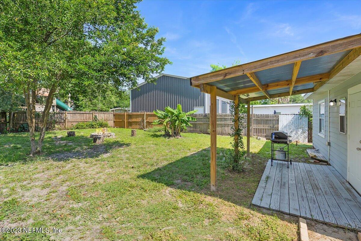 197 Lynn Street St. Augustine, FL 32084 - Photo 22 of 24 a view of backyard with green space
