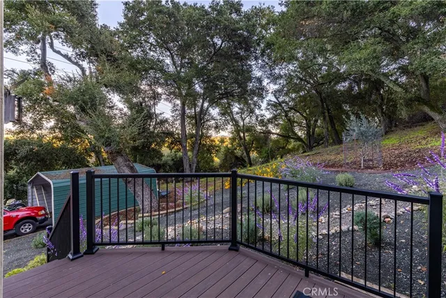 a view of deck with wooden floor and outdoor seating