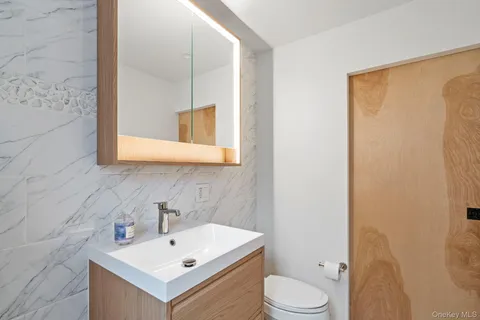 $325,000 | 52-21 65th Place, Unit 2J | Maspeth