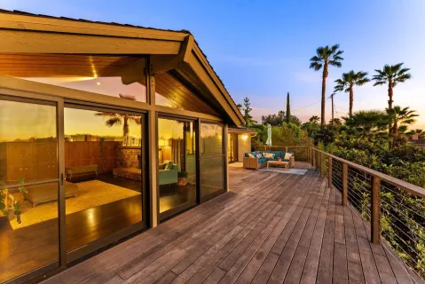 a outdoor living space with furniture and garden view