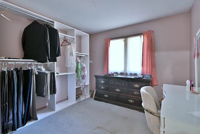 a room with furniture and a window