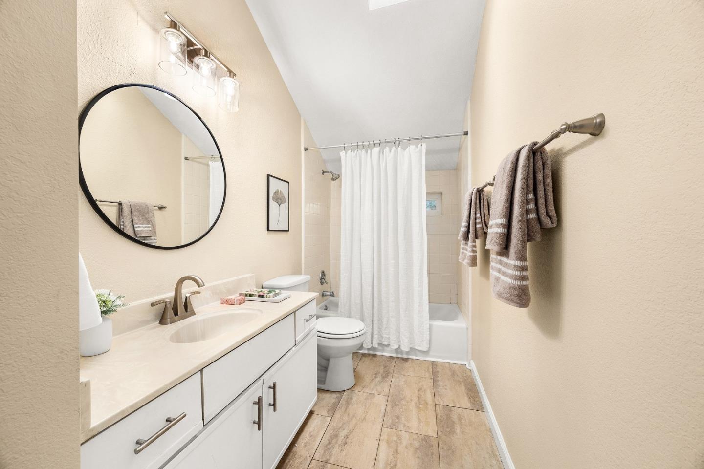 1644 Ocean Street Santa Cruz, CA 95060 - Photo 37 of 60 a bathroom with a sink and a mirror