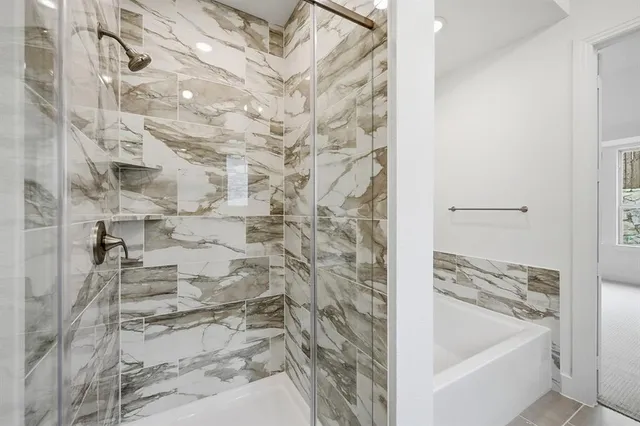 a bathroom with a sink double vanity and a mirror