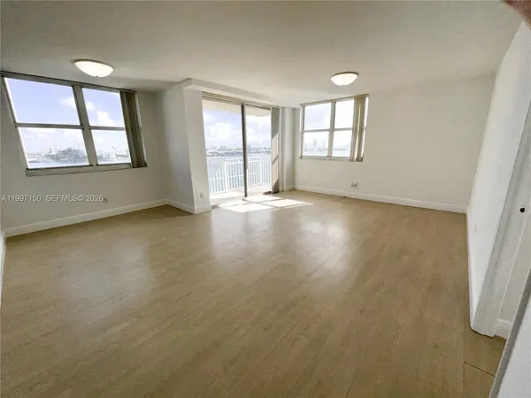an empty room with windows