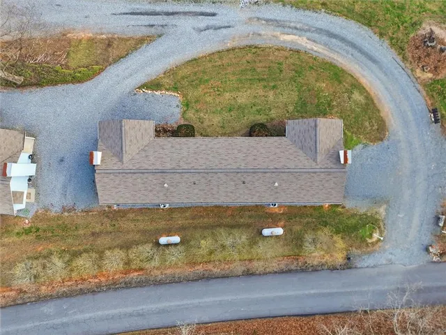 a view of park with swings