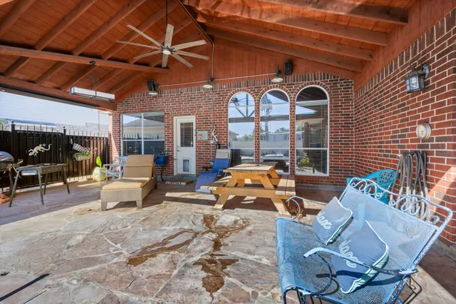 a view of living room filled with furniture