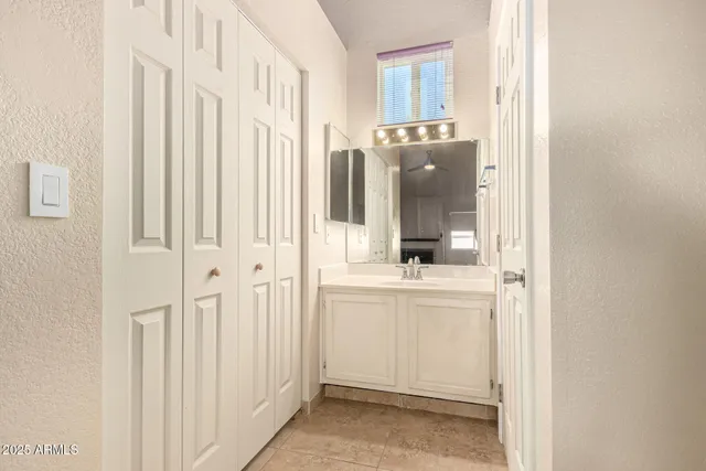 a bathroom with a toilet and a bath tub