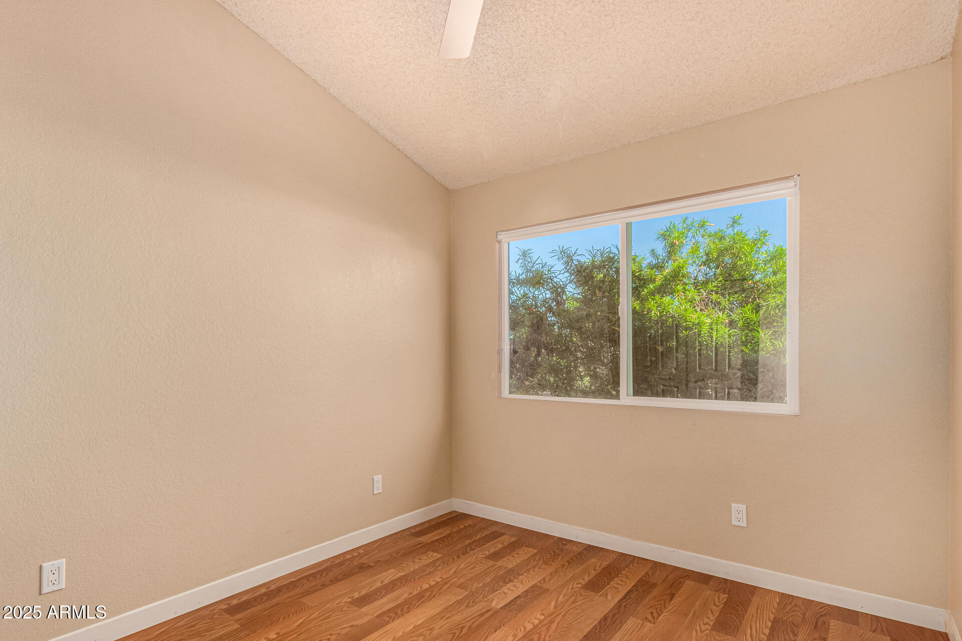 510 North Alma School Road, Unit 159 Mesa, AZ 85201 - Photo 21 of 36 wooden floor in an empty room with a window