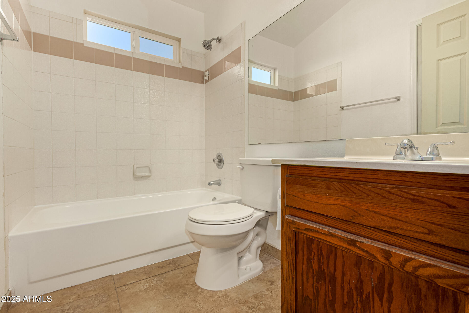 510 North Alma School Road, Unit 159 Mesa, AZ 85201 - Photo 23 of 36 a bathroom with a sink toilet and shower