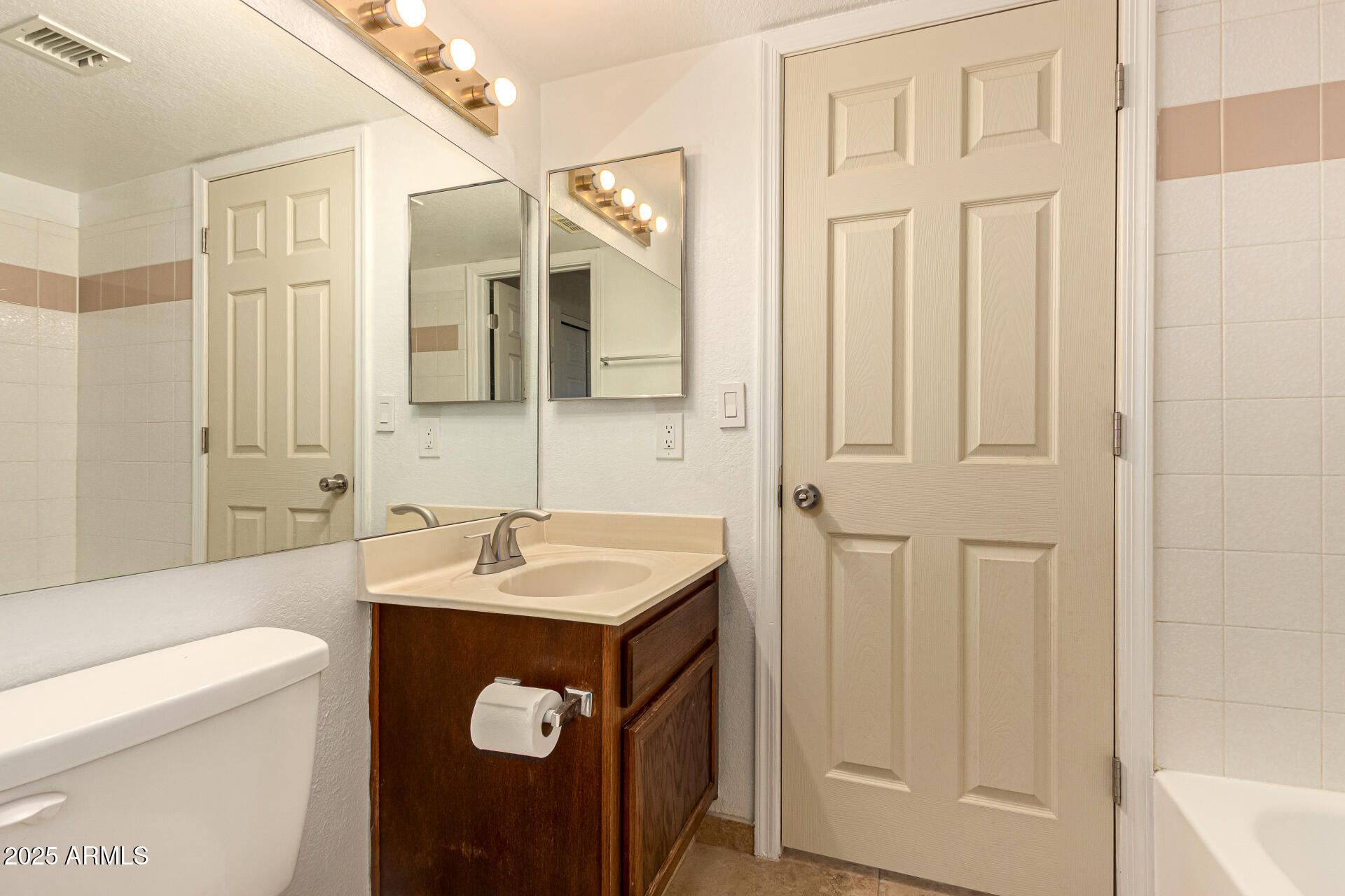510 North Alma School Road, Unit 159 Mesa, AZ 85201 - Photo 27 of 36 a bathroom with a sink toilet and shower