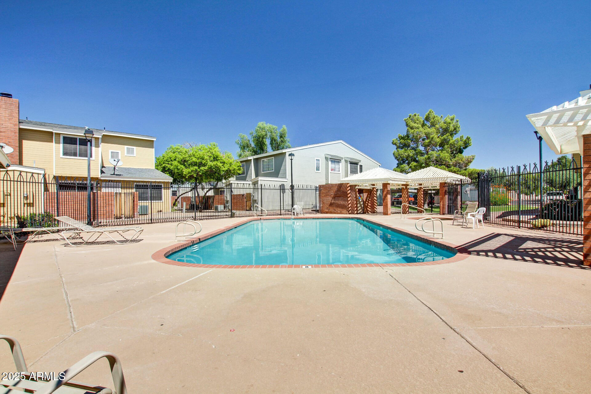 510 North Alma School Road, Unit 159 Mesa, AZ 85201 - Photo 32 of 36 a aerial view of a house with swimming pool
