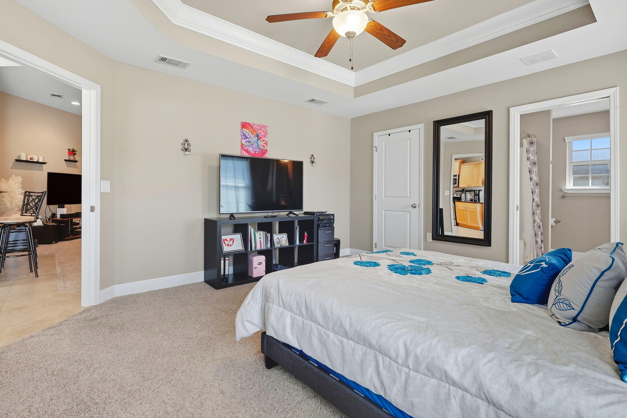 219 January Court Crestview, FL 32539 - Photo 19 of 37 a bedroom with a bed and a flat screen television