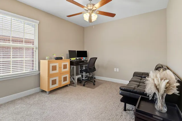 a room with furniture and window