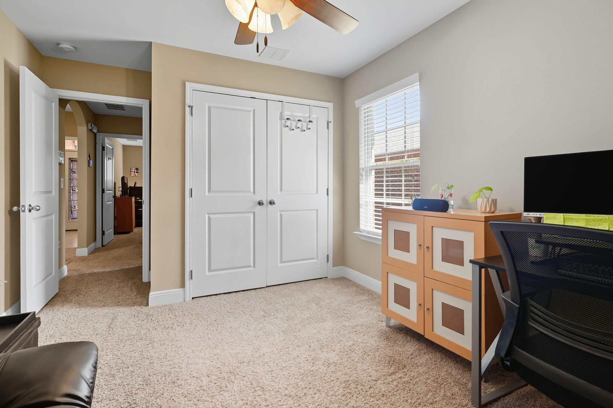 219 January Court Crestview, FL 32539 - Photo 21 of 37 a view of kitchen with furniture flat screen tv and windows