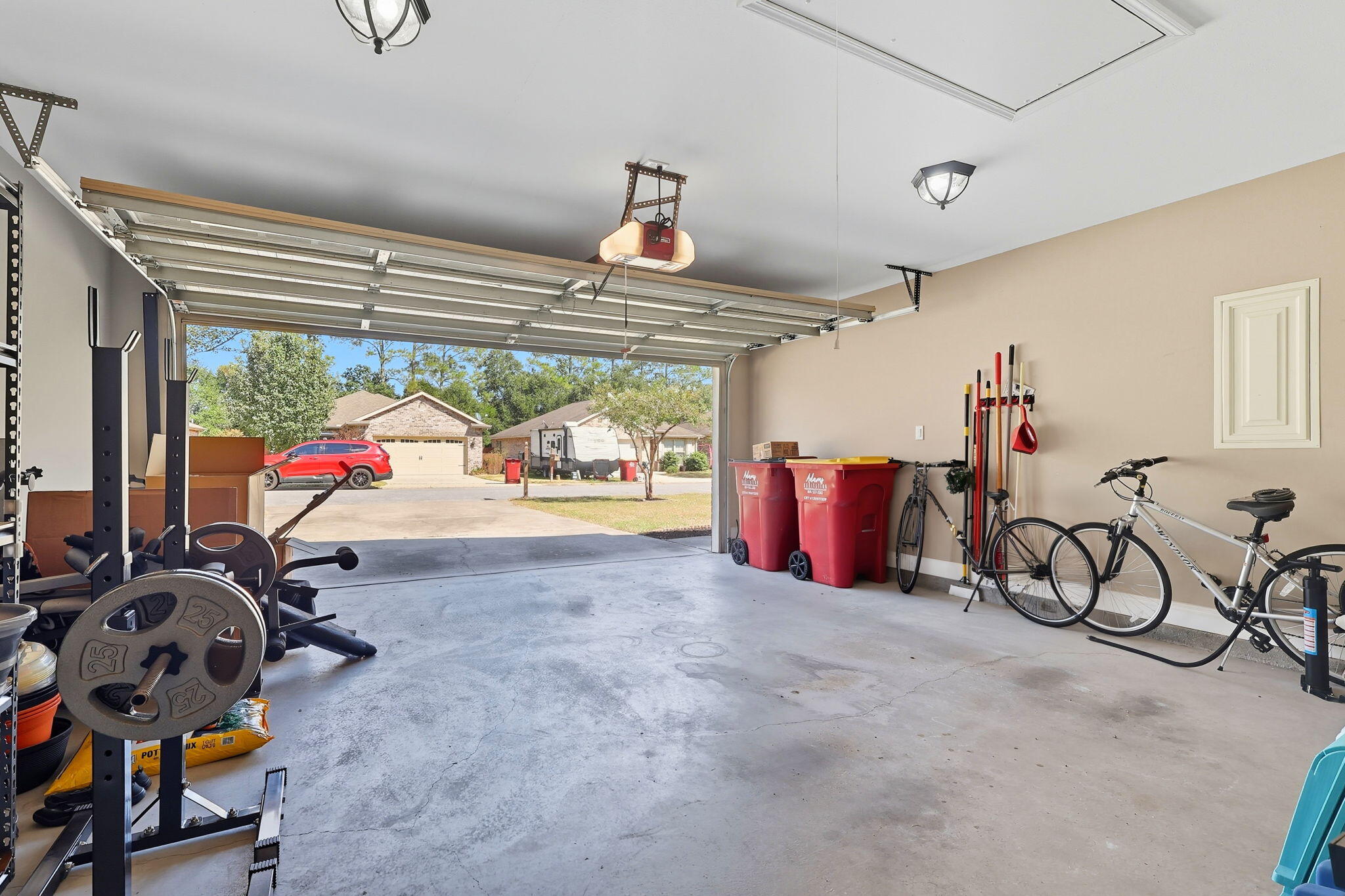 219 January Court Crestview, FL 32539 - Photo 32 of 37 a view of gym equipment with a view of living room