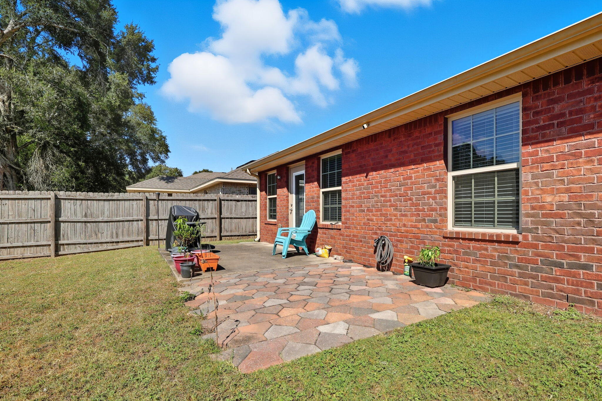 219 January Court Crestview, FL 32539 - Photo 36 of 37 a view of a backyard with a patio