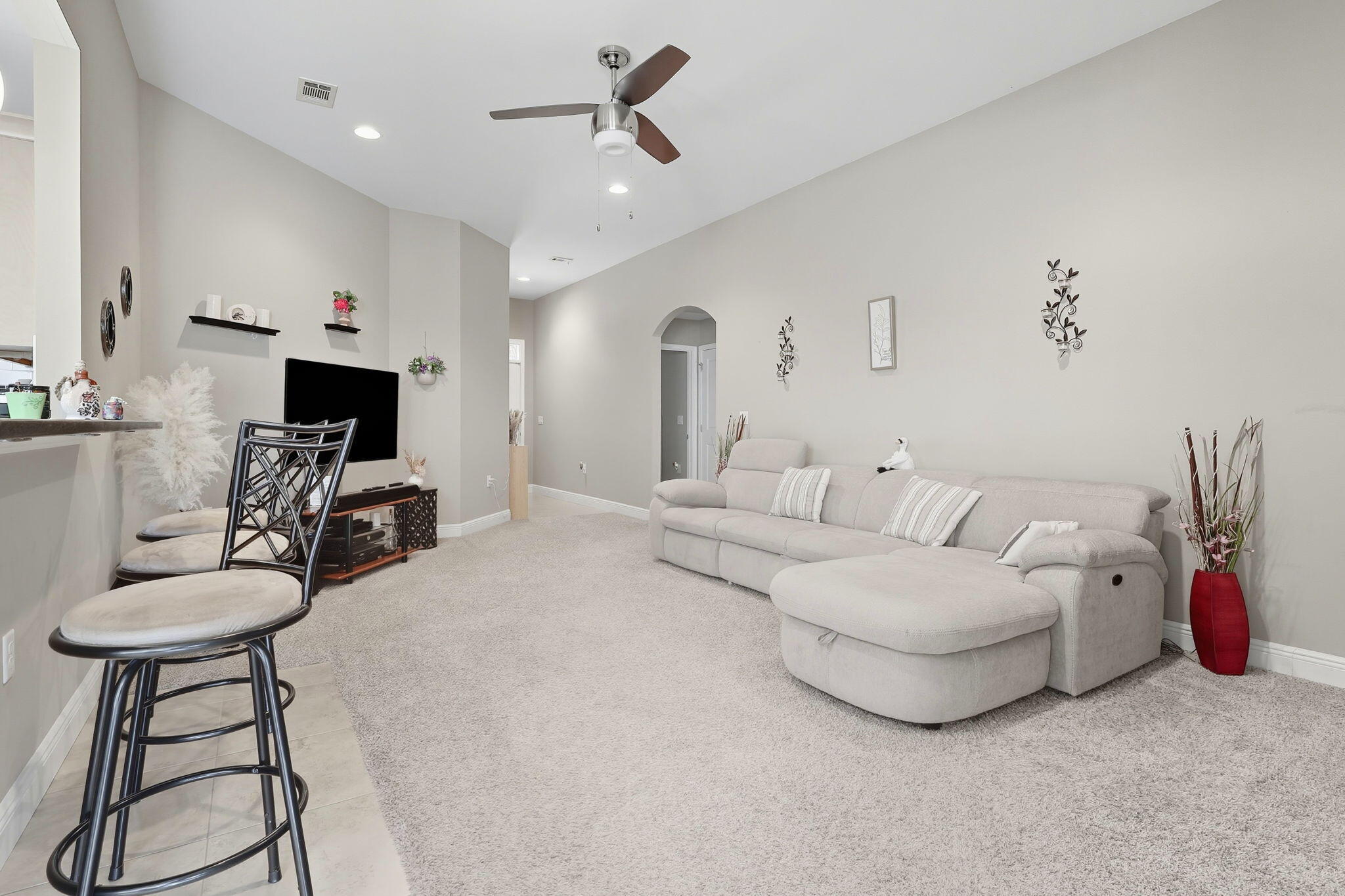 219 January Court Crestview, FL 32539 - Photo 7 of 37 a living room with furniture and a flat screen tv