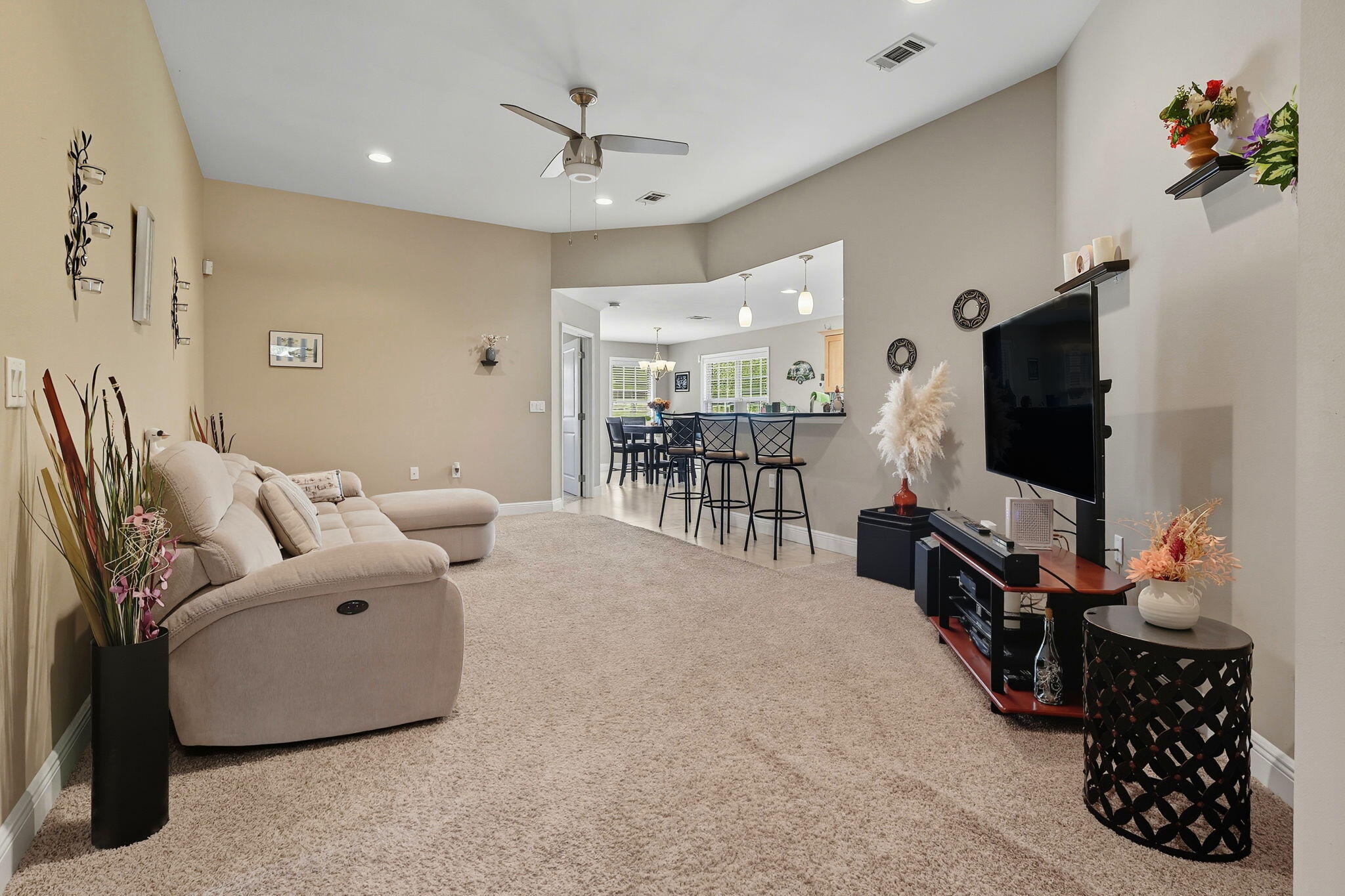 219 January Court Crestview, FL 32539 - Photo 9 of 37 a living room with furniture and a flat screen tv