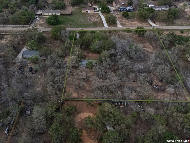 135 Savannah Ridge Von Ormy, TX 78073 - Photo 41 of 45 an aerial view of a house with a yard