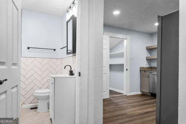 a bathroom with a sink and a toilet