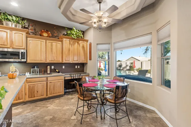 a bedroom with bed and dresser