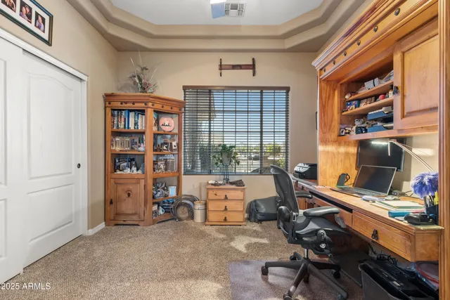 a spacious bathroom with a tub sink and mirror
