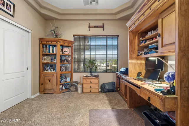 a bathroom with a double vanity sink mirror and bathtub