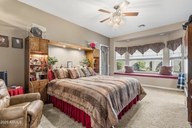 a view of a patio with table and chairs and potted plants