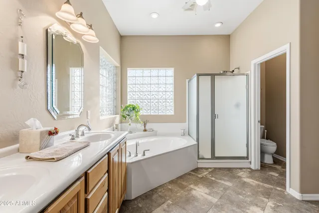 an aerial view of a house with a swimming pool