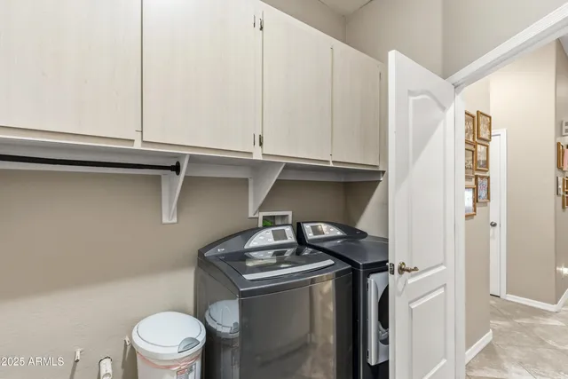 a front view of a house with a garage