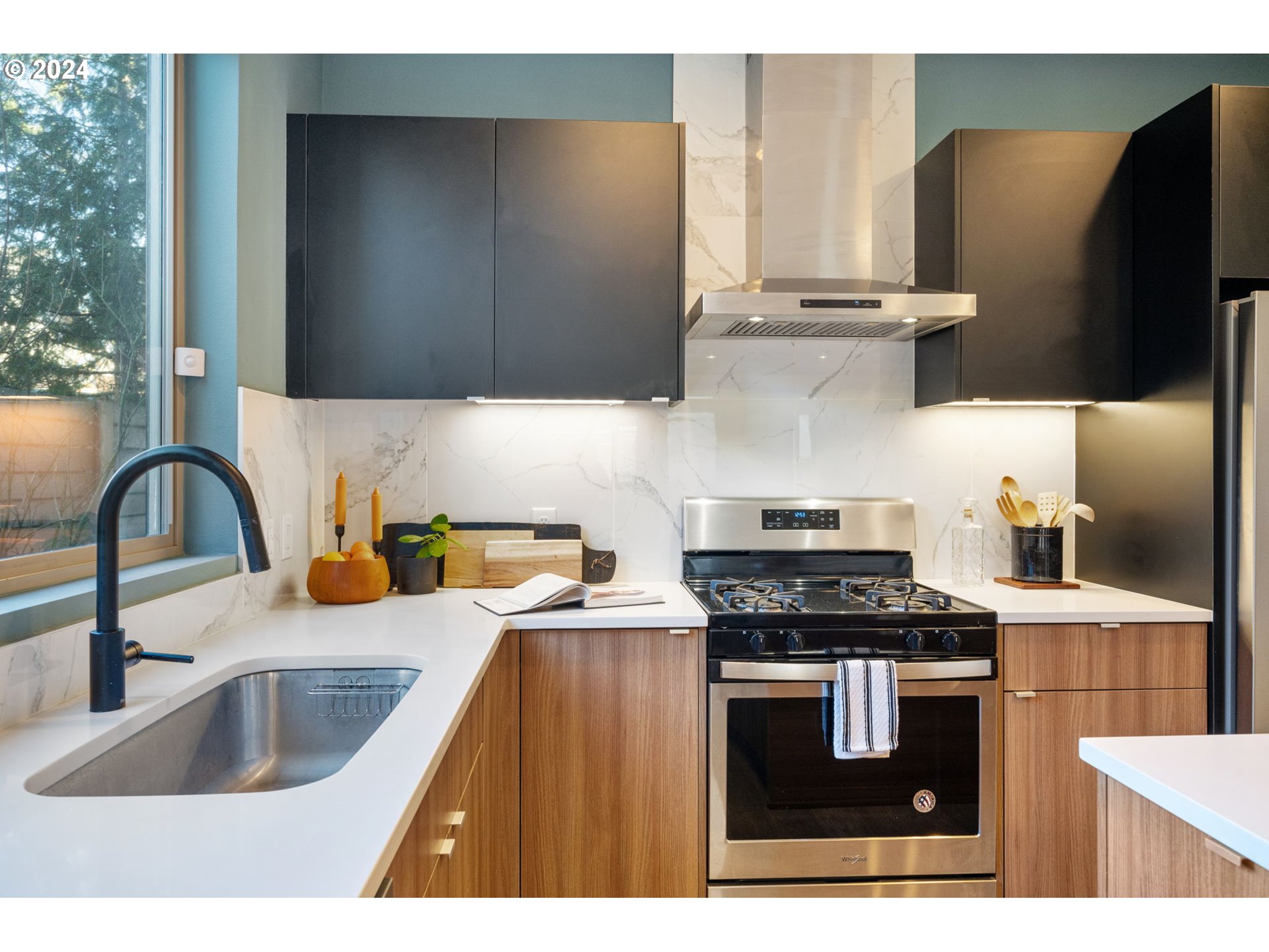 1616 Northeast 45th Avenue, Unit 1 Portland, OR 97213 - Photo 11 of 30 a kitchen with granite countertop a sink a stove and refrigerator