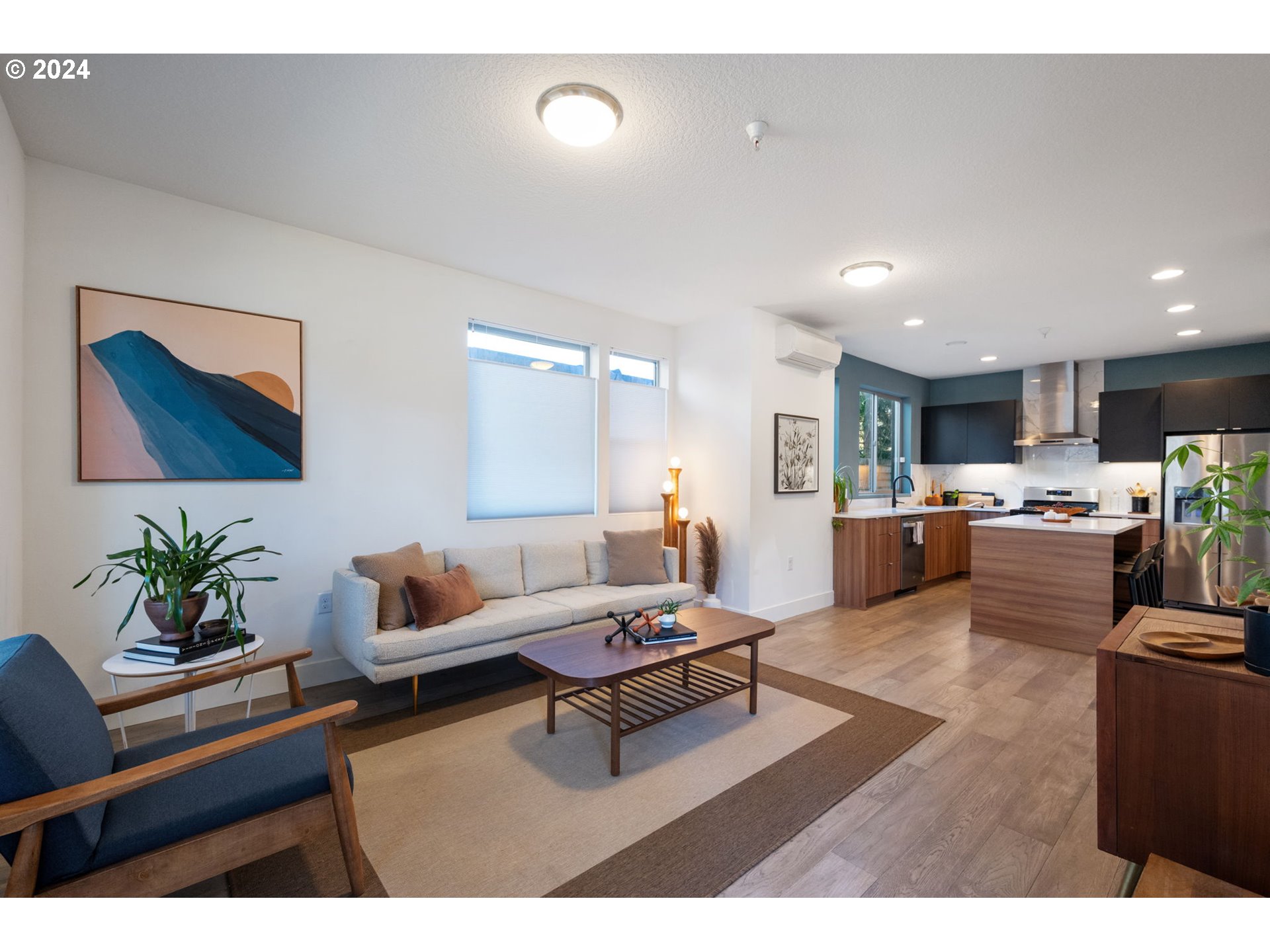 1616 Northeast 45th Avenue, Unit 1 Portland, OR 97213 - Photo 4 of 30 a living room with furniture and kitchen view