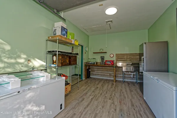 a room with furniture and a flat screen tv