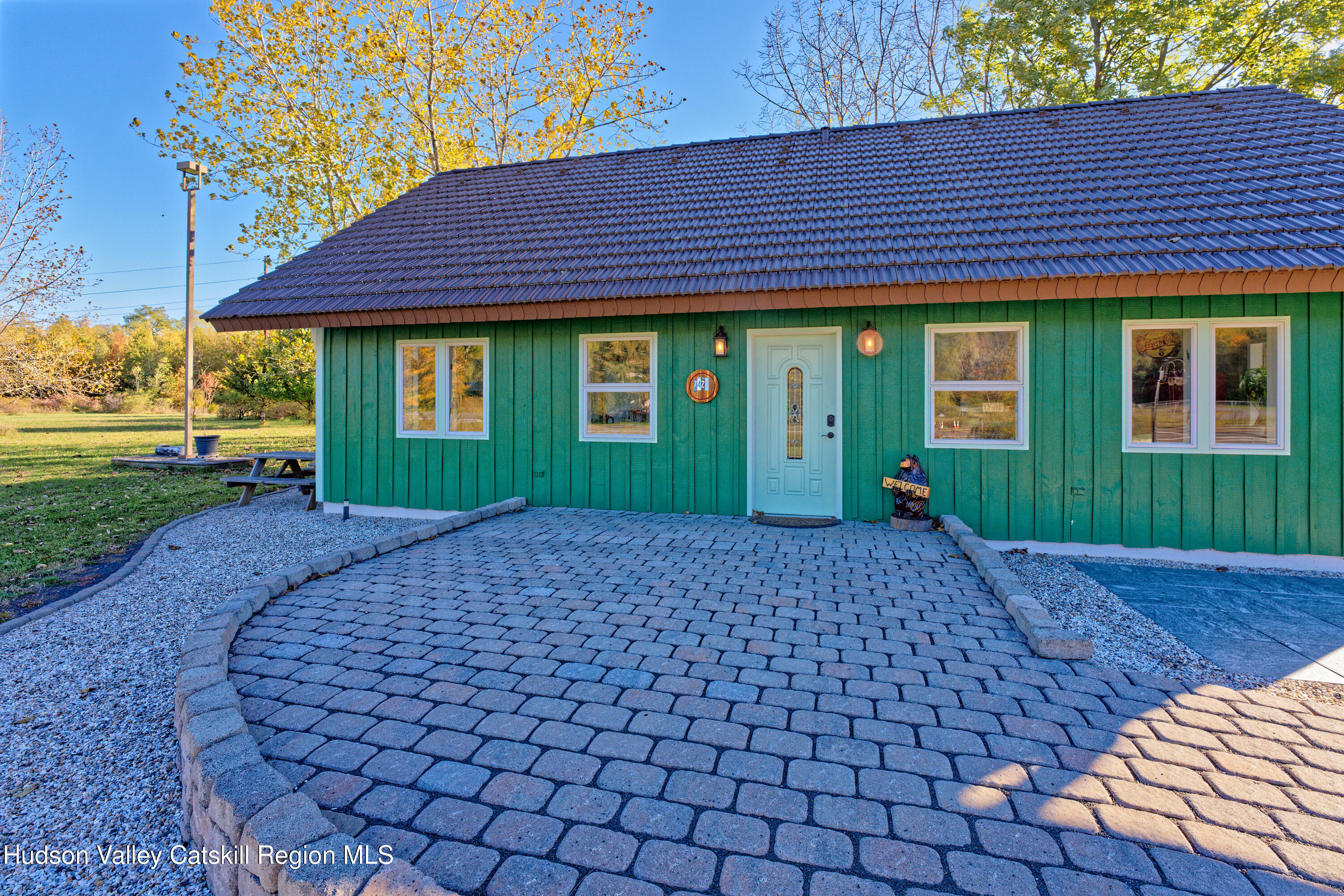 7426 Highway 32 Cairo, NY 12413 - Photo 3 of 49 a front view of a house with garden