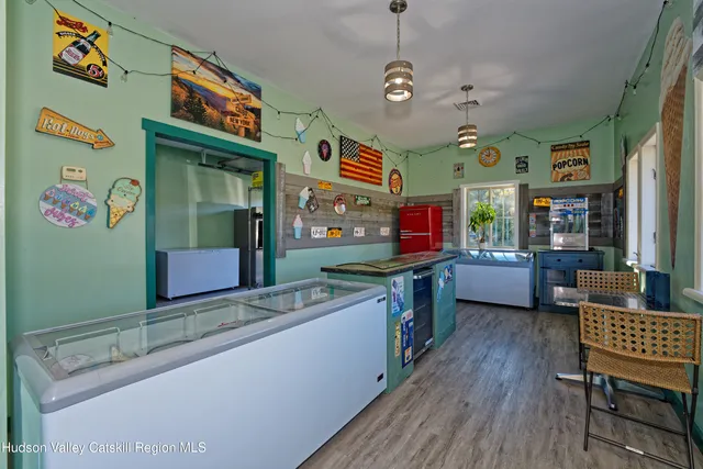 a kitchen with stainless steel appliances granite countertop a stove and a wooden cabinets