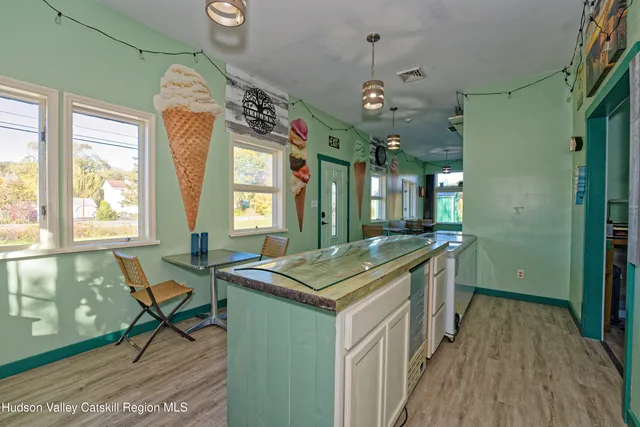 a kitchen that has a lot of cabinets in it